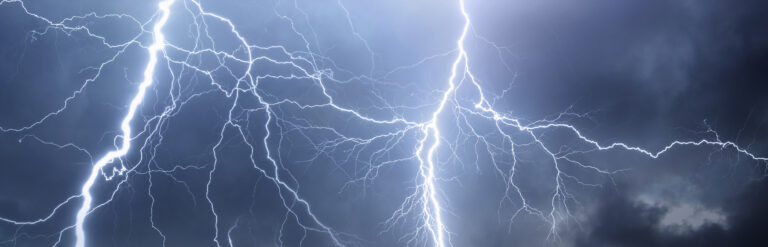 Thunder, lightnings and rain on stormy summer night